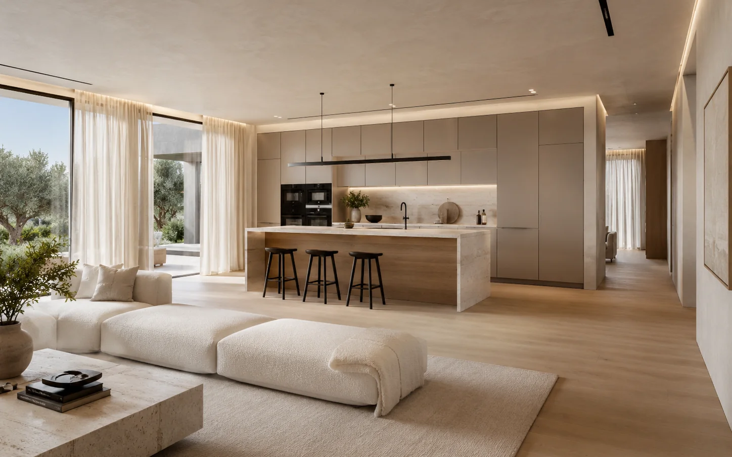 Salón abierto conectado con la cocina en una vivienda de tonos naturales