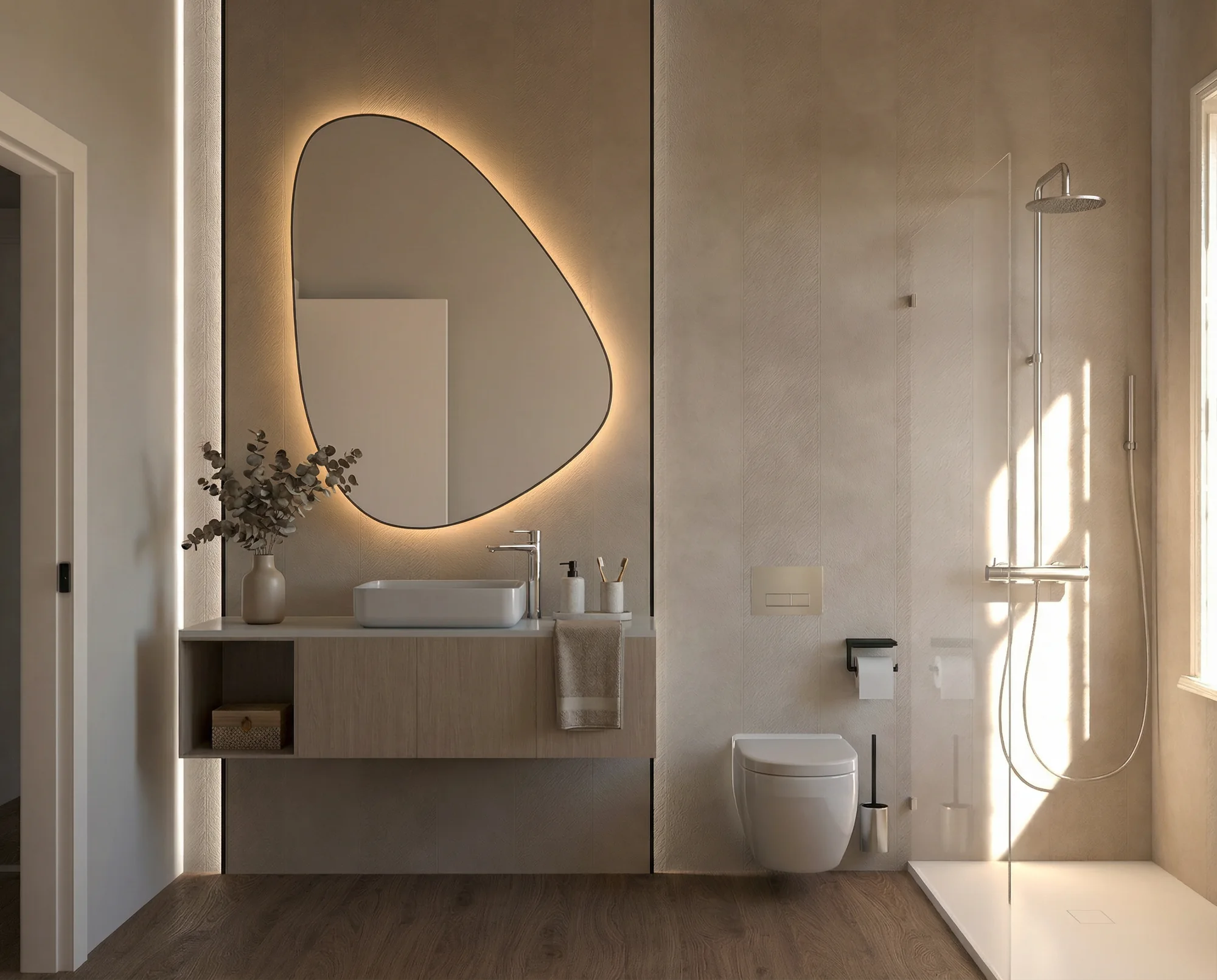 Baño con mueble suspendido y espejo orgánico retroiluminado